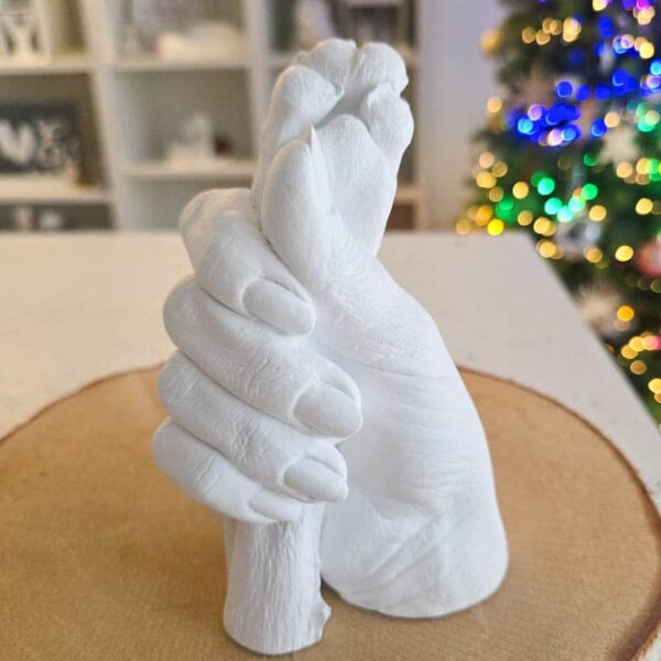 Hundepfotenabdruck 3d mit Hand zusammen