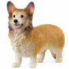 Schleich® Spielfigur Welsh Corgi: stehender Hund in Braun-Weiß mit großen Ohren, schwarzer Nase und leicht geöffnetem Maul, freigestellt vor weißem Hintergrund.
