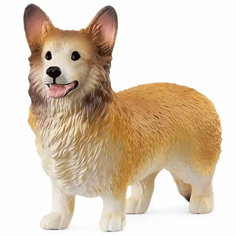 Schleich® Spielfigur Welsh Corgi: stehender Hund in Braun-Weiß mit großen Ohren, schwarzer Nase und leicht geöffnetem Maul, freigestellt vor weißem Hintergrund.